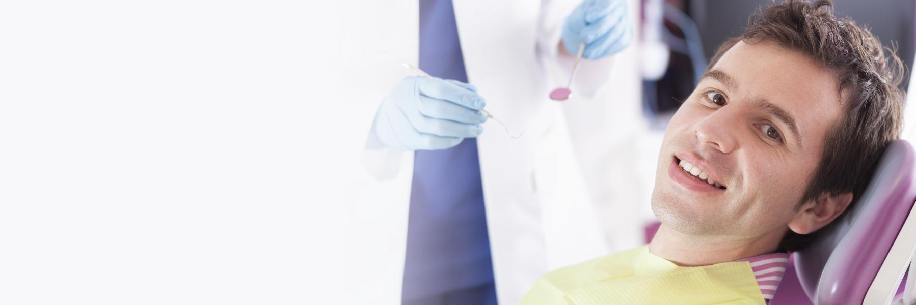 Patient in treatment chair for root canals in Lake Charles LA
