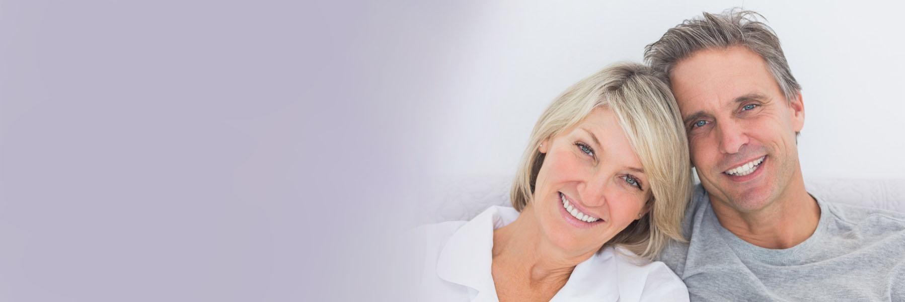 Sedation dentistry patients smiling at our 70605 dentist office